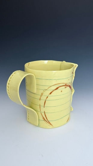 Yellow Notebook paper with coffee stains
